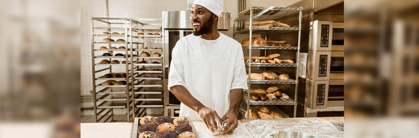 baker working with dough